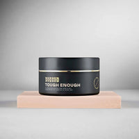 BARBER BARBER Tough Enough Strong Hold Styling Clay 100g - zwart potje op beige blok, grijze studio