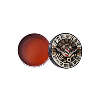 BROSH Hard Pomade - geopend blik met oranje textuur op witte achtergrond
