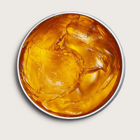 Bullfrog High Definition Glossy Pomade - open blik met glanzende amberkleurige pomade