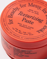 Firsthand Supply Texturizing Paste - close-up van deksel met tekst
