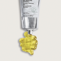 Bullfrog Invisible Shaving Gel - tube met gele gel eruit geknepen