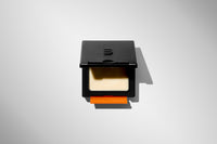 Blumaan Heavy Hold Clay - open pot van bovenaf met cremekleurige inhoud en oranje label
