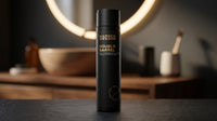 BARBER BARBER Double Barrel Shampoo 200ml - fles op donkere badkamer met verlichte ronde spiegel