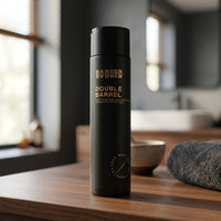 BARBER BARBER Double Barrel Shampoo 200ml - fles op houten wastafelblad bij het raam