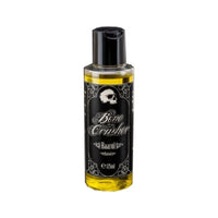 Bone Crusher Haarolie - vooraanzicht 125ml fles met schedellabel en gele olie
