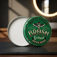 BROSH Matte Finish Clay Pomade - open blik met deksel rechtop op leisteen in badkamer