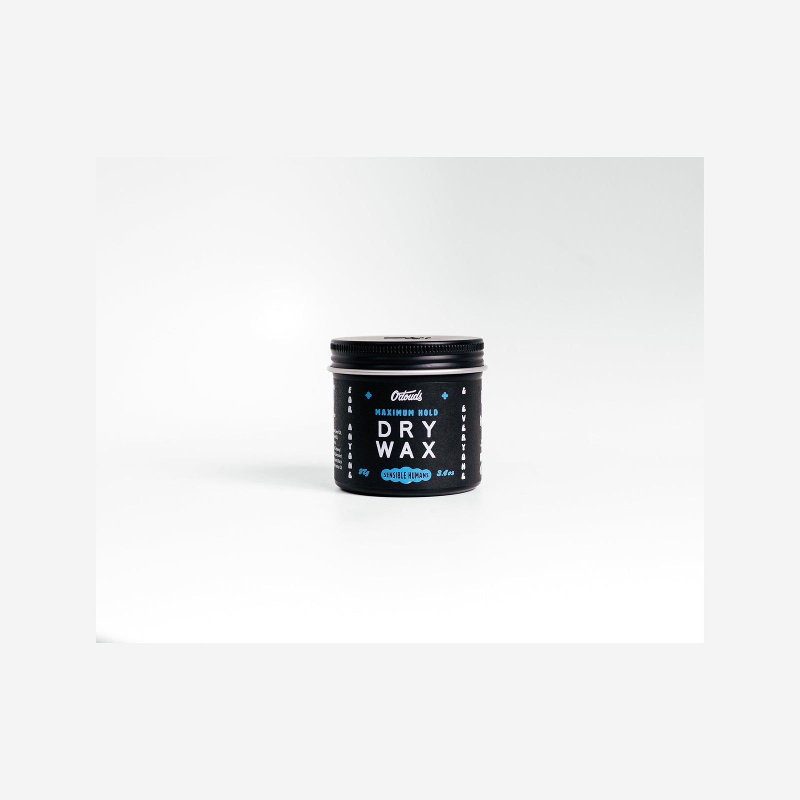 O'Douds Dry Wax, framifrån av svart burk med blå bokstäver och lock