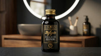 JS Sloane Hair & Beard Elixir - flesje op tafel voor verlichte spiegel