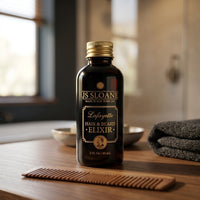 JS Sloane Hair & Beard Elixir - flesje 60 ml op houten tafel met kam