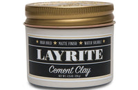 Layrite Cement Clay - vooraanzicht pot met zwart etiket en gouden deksel