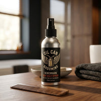 Oil Can Grooming Benchmark Sea Salt Spray - fles op tafel met kam en handdoek