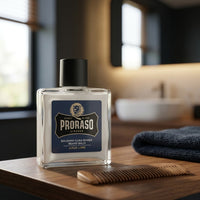 Proraso Beard Balm Azur Lime - flacon op kaptafel met kam en handdoek