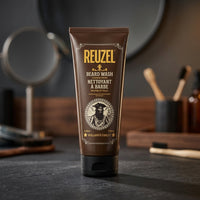 Reuzel Beard Wash Clean & Fresh 200ml - staande tube op leisteen met barberspullen