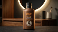 Reuzel Refresh No Rinse Beard Wash - fles vooraanzicht op badkamerkastje bij spiegel