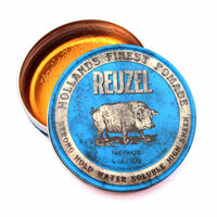 Reuzel Blue Pomade - open blik 113g met glanzende oranje inhoud