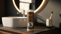 Reuzel Surf Tonic 350ml - sprayfles op wastafel bij ronde spiegel