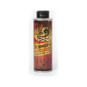 Schmiere Ex Shampoo, metallflaska med vintageetikett och dödskalleillustration