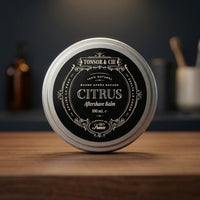Tonsor & Cie Aftershave Balm Citrus - gesloten blik op houten badkamerblad